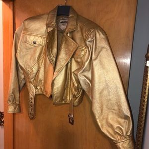 Gold cropped leather jacket.